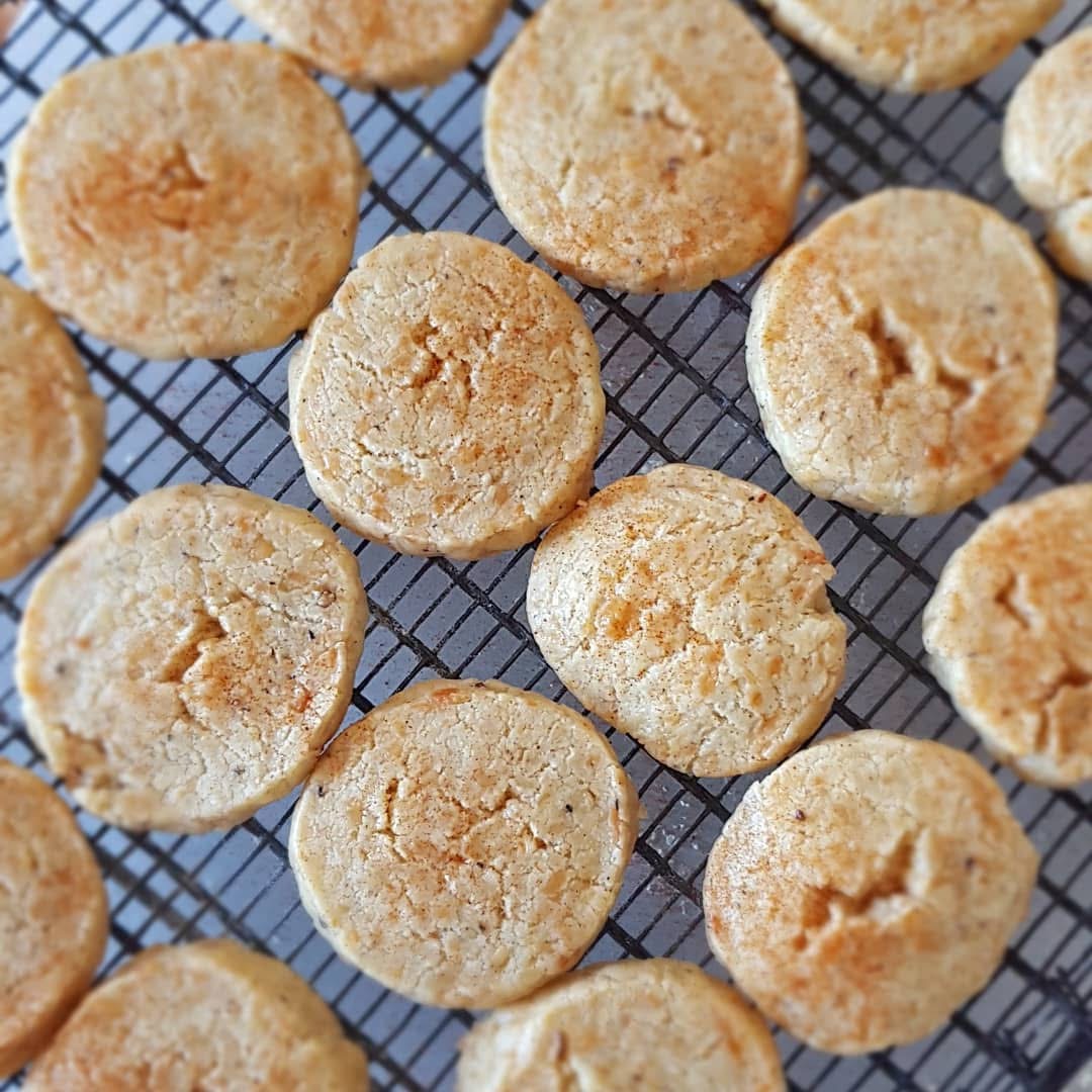 photo of round biscuits cooling on a rack