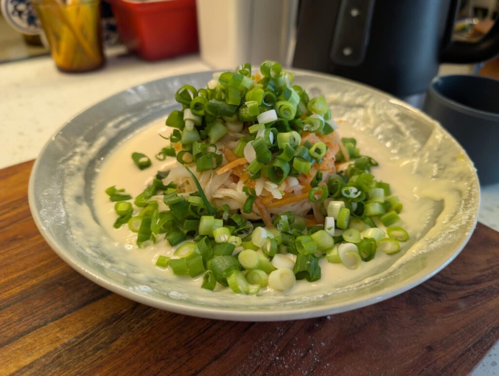 photo of a pancake batter with grated and chopped vegetables